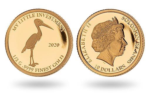 золотые монеты для инвестиций с птенцом аиста от островов Соломона